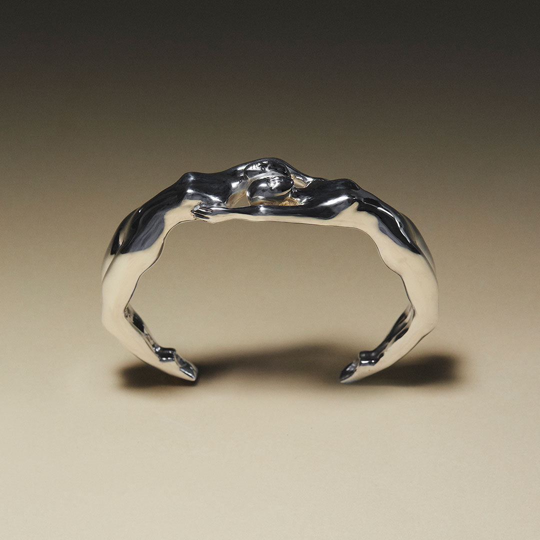 Sterling silver bracelet with fused female bodies