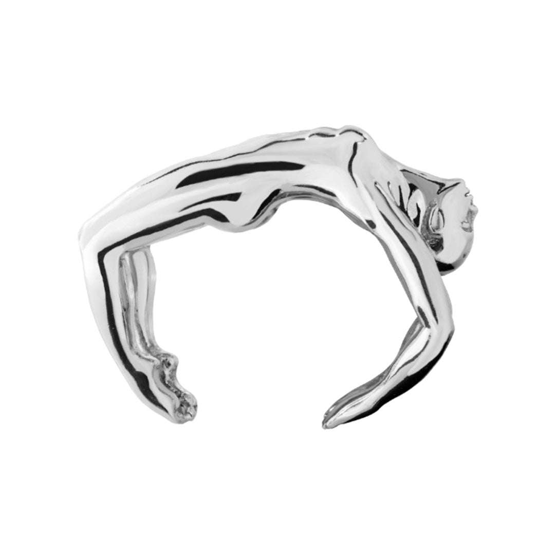 Sculptural bracelet featuring a female body in sterling silver