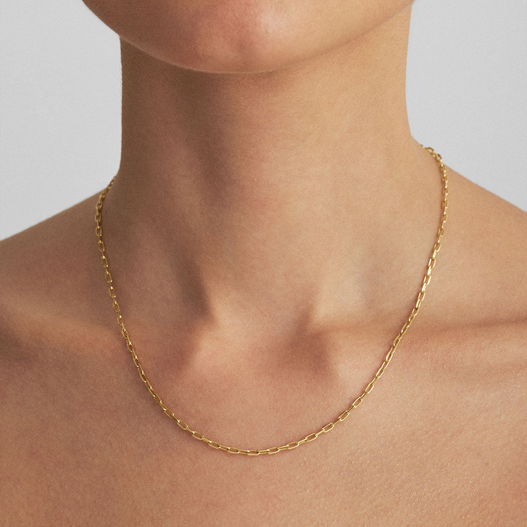 Model wearing 45cm Cartier chain in sterling silver with 18k gold plating