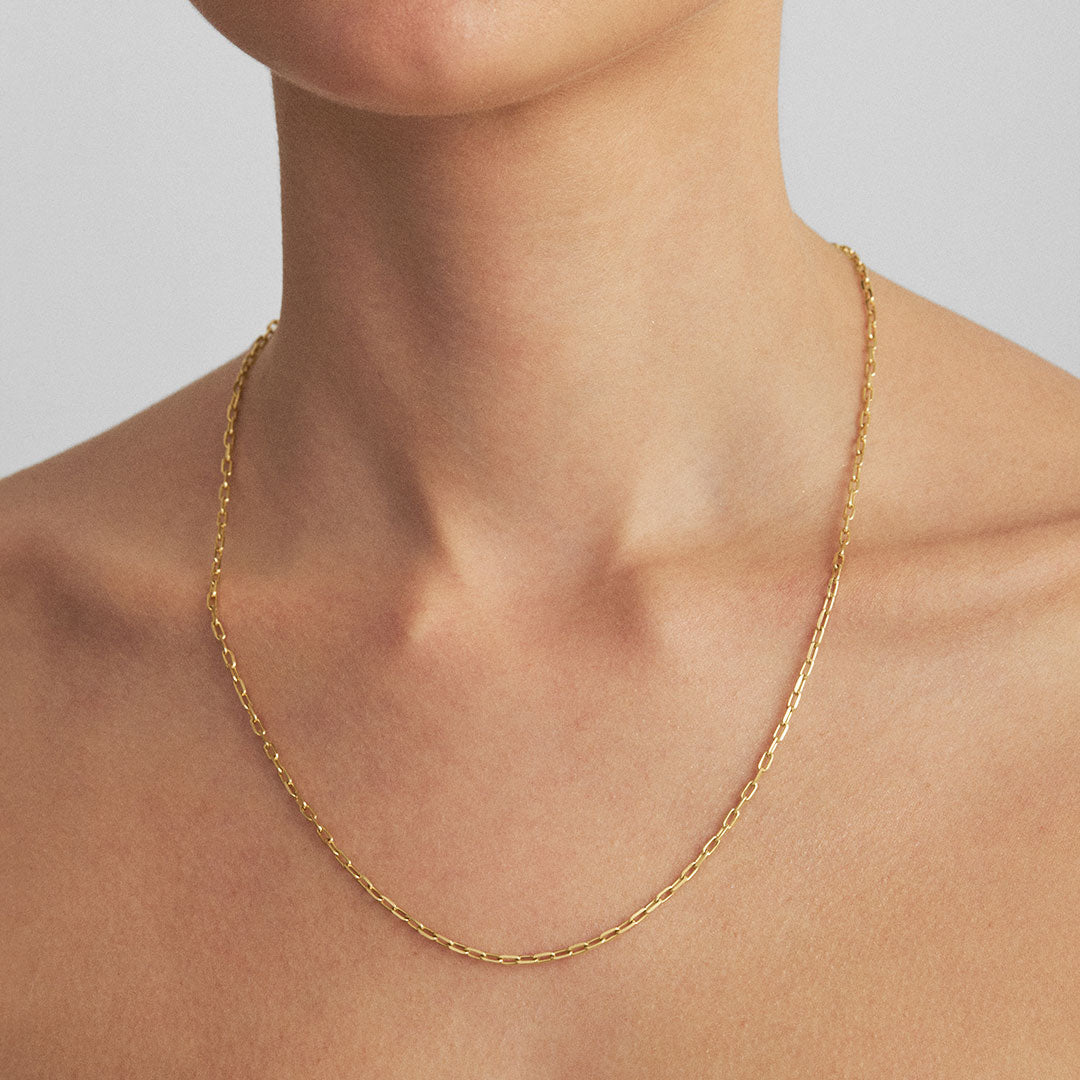 Model wearing 50cm Cartier chain in sterling silver with 18k gold plating