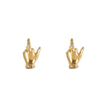 Paola Vilas middle finger earrings in 18k gold and diamonds
