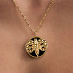 Model wearing Aries zodiac necklace in sterling silver with 18k gold plating