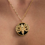 Model wearing Aries zodiac necklace in sterling silver with 18k gold plating