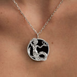 Model wearing Capricorn zodiac necklace in sterling silver