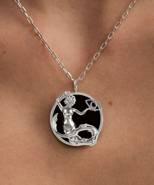 Model wearing Capricorn zodiac necklace in sterling silver