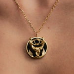 Model wearing Pisces zodiac necklace in sterling silver with 18k gold plating
