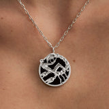 Model wearing Scorpio zodiac necklace in sterling silver