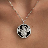 Model wearing Taurus zodiac necklace in sterling silver