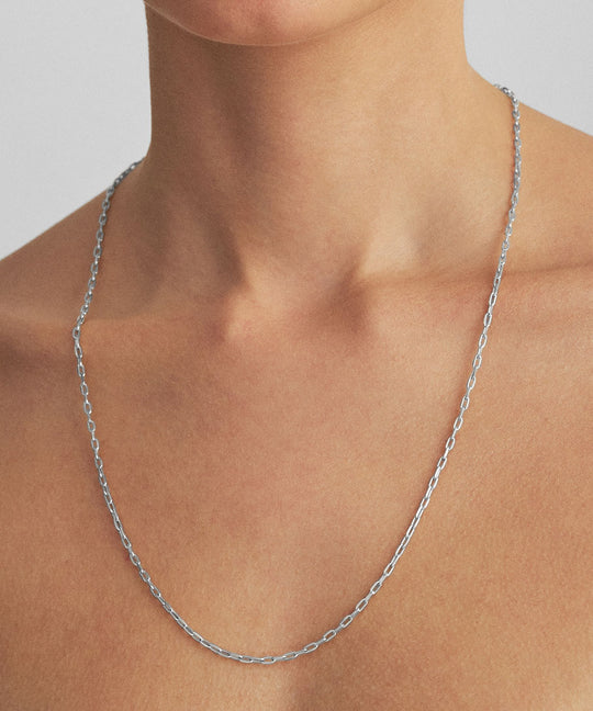 Model wearing 60cm Cartier chain in sterling silver