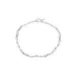 Paola Vilas bracelet in sterling silver featuring female bodies in a chain