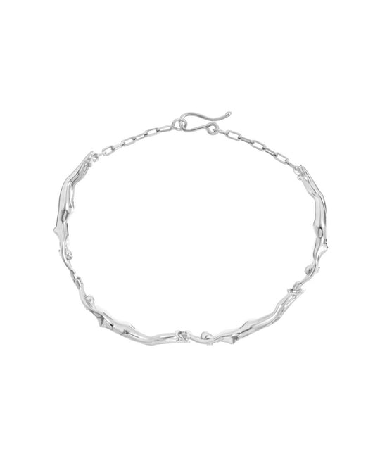 Paola Vilas bracelet in sterling silver featuring female bodies in a chain